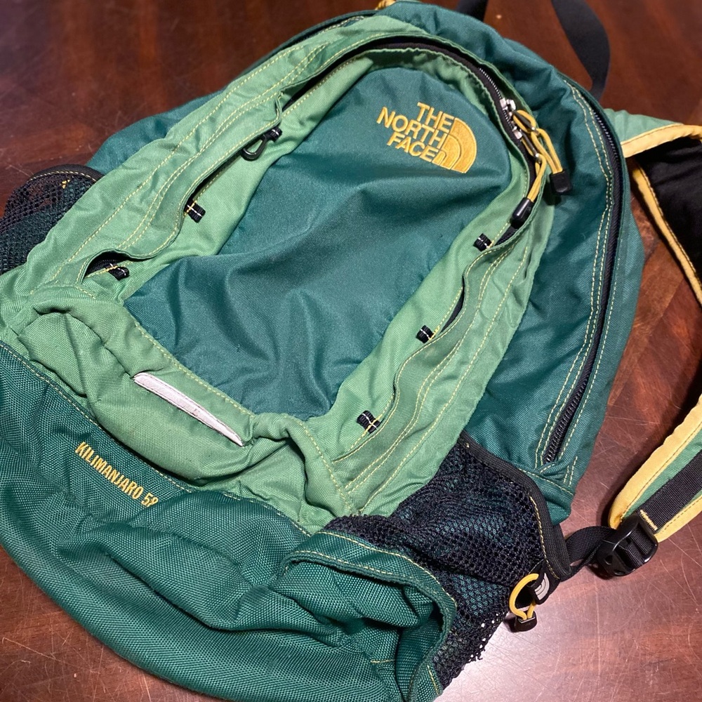 The North Face Green Kilimanjaro 50 Daypack Backpack with Yellow Logo